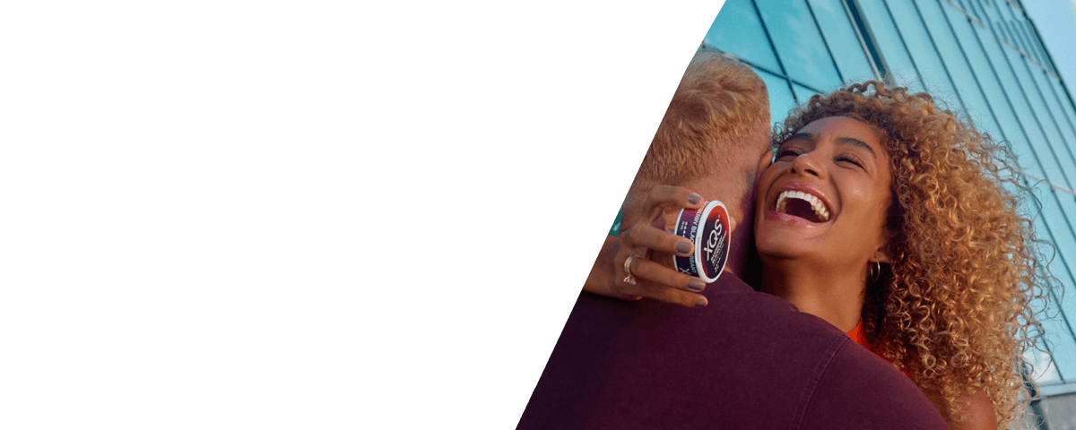 Happy couple with XQS box